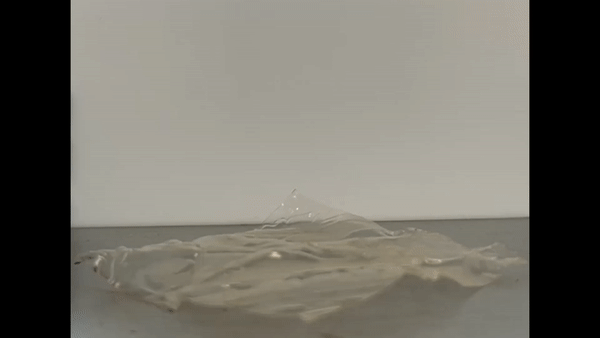 Video of opaque VPR plastic reforming into an origami crane shape while being heated on a hot plate.